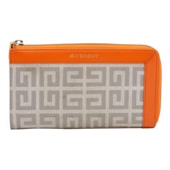 Portafoglio firmato in tela e pelle arancione/grigio di Givenchy
