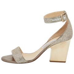 Jimmy Choo Sandalias con tira al tobillo de purpurina dorada metalizada talla 39.5