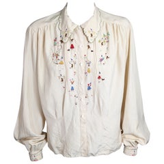 Charmante folkloristisch bestickte Seidenbluse
