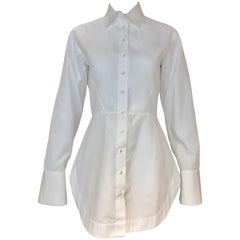 Alaia chemise en coton blanc avec queue à œillets