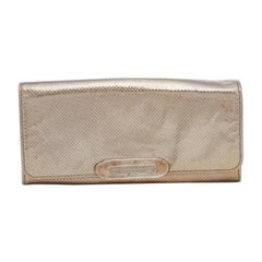 Tod's Metallic Gold Strukturiertes Leder Kontinental Brieftasche