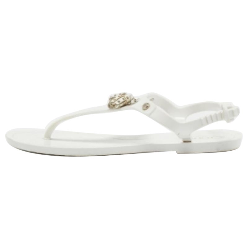 Tod's Weiße flache Sandalen aus Gummi mit Fransenschleife und Zehenschleife Größe 36
