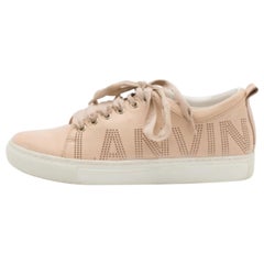 Baskets basses Lanvin en cuir beige perforé avec logo, taille 37