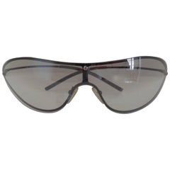 Gucci Sonnenbrille mit durchsichtigen Silberbeschlägen