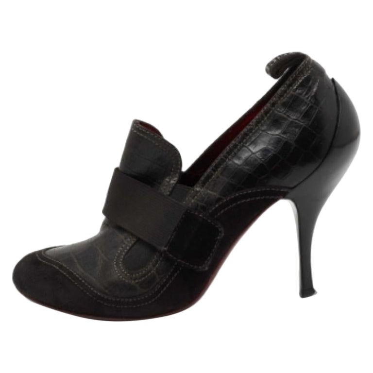 Bottines en cuir et daim gaufré noir Roberto Cavalli Taille 37