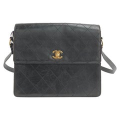 Chanel Bolso con solapa Kelly Piel negra Correa ajustable Herrajes dorados 24k