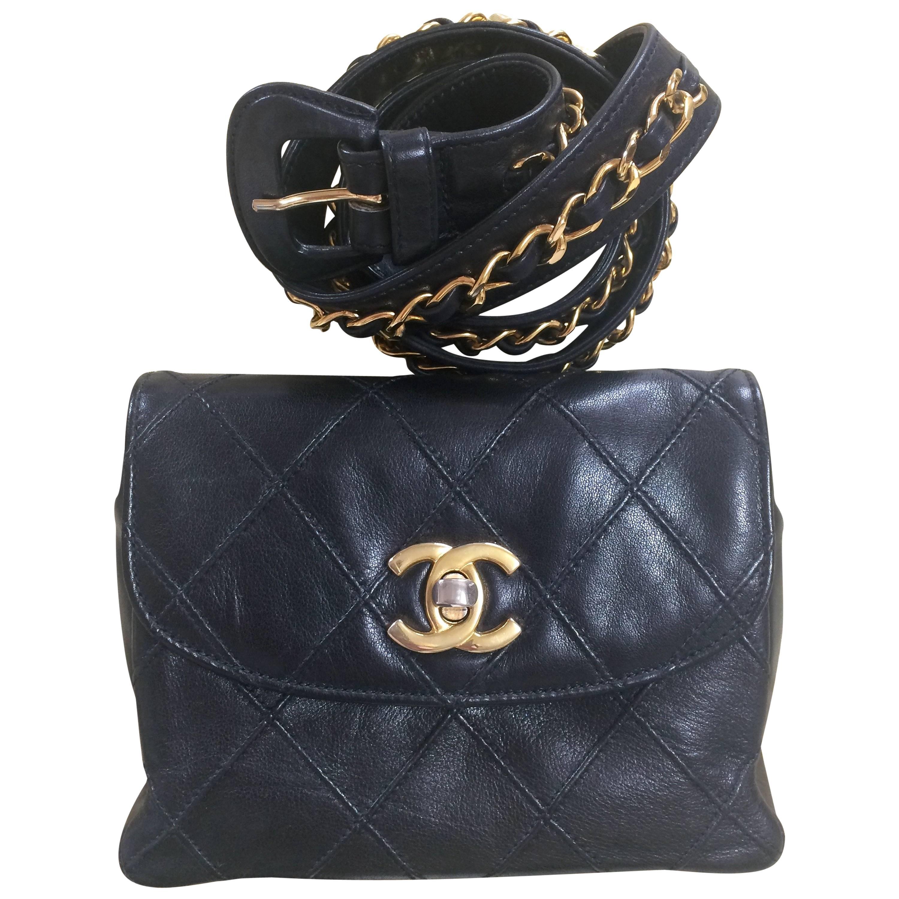 Vintage CHANEL black waist purse, fanny bag with golden chain belt and CC mark.