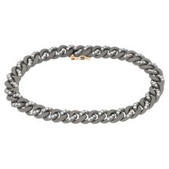 Bracciale MANO J. catena Groumette in titanio diamanti bianchi oro rosso 18kt M