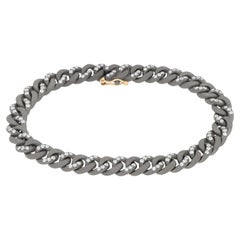 Bracciale MANO J. catena Groumette in titanio diamanti bianchi oro rosso 18kt S