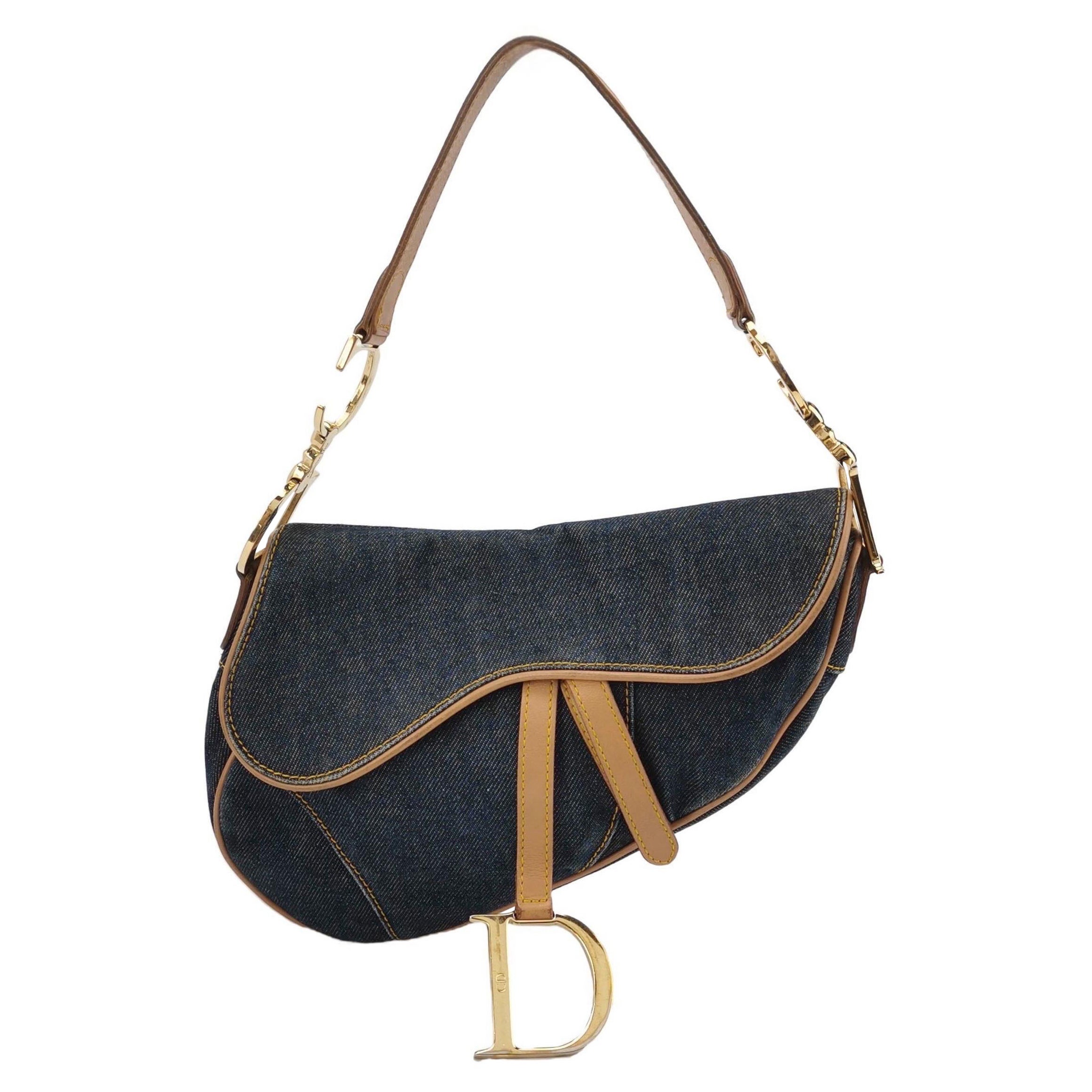 Dior Saddle Vintage Navy Denim con fodera in seta e finiture in pelle
