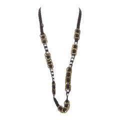 CHAMOREL black grosgrain ribbon clear crystal bronze rings long necklace