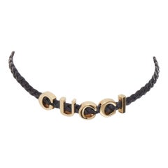 GUCCI black braided calf leather gold tone logo choker necklace