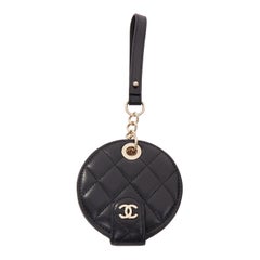 CHANEL black quilted lambskin leather CC logo chain round luggage tag