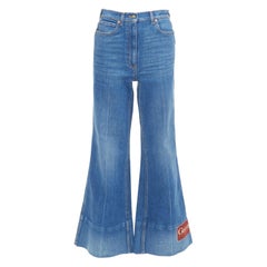 GUCCI Alessandro Michele 2021 logo rouge jean évasé en denim bleu 25"