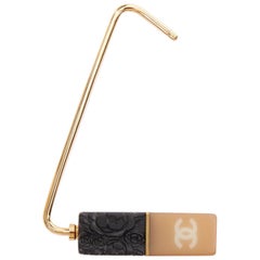 CHANEL 07A Camellia Lipstick CC logo nude black gold resin purse hook