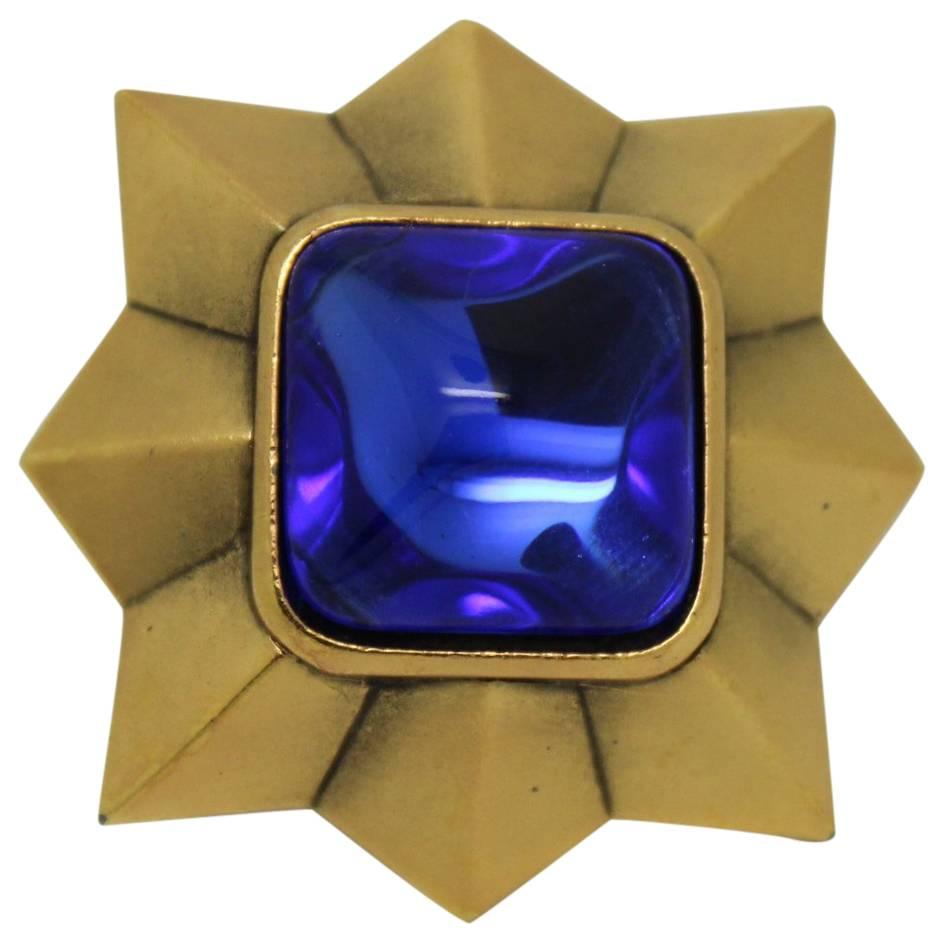 Yves Saint Laurent Gold Plated Brooch with Blue Stone For Sale
