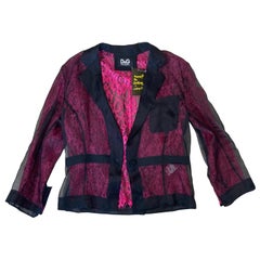 Dolce & Gabbana Blazer aus rosa und schwarzer Spitze.