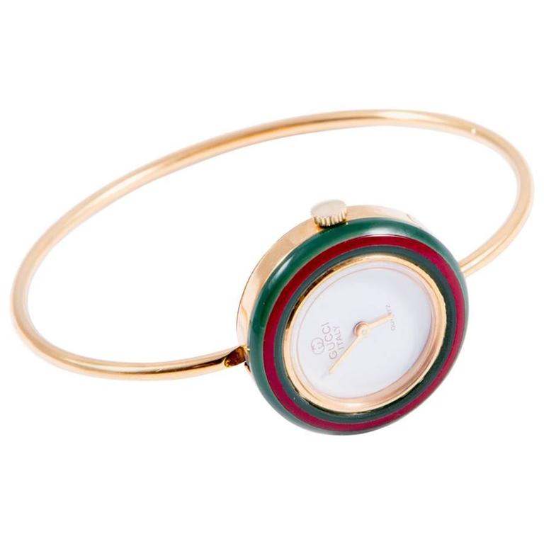 1970s Gucci Gold plated Bangle Watch Multicolor Interchangeable Bezels ...