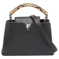 Bolso Capucines BB Louis Vuitton negro/beige de piel Taurillon y pitón