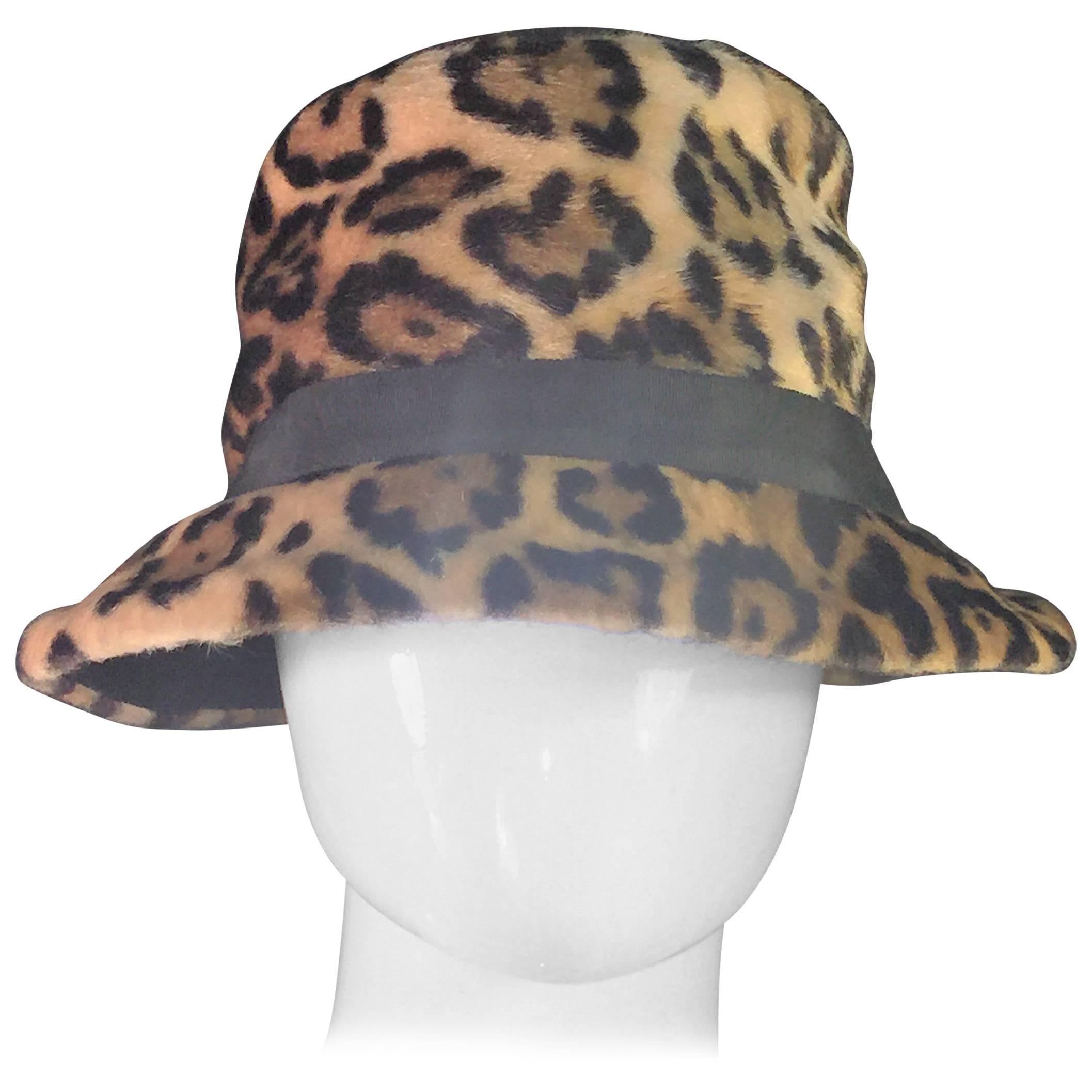 Gorgeous Faux Leopard Fur Hat with Jaunty Black Grosgrain Ribbon For Sale