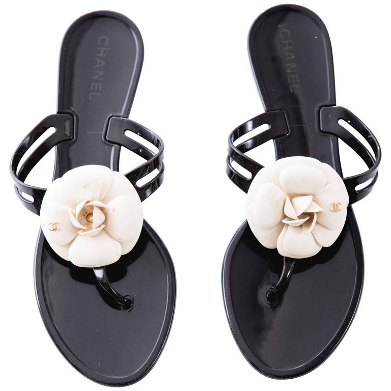 Chanel Black Jelly Slide Sandals With Cream Camellia at 1stDibs