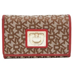 Portafoglio francese in tela e pelle DKNY beige/rosso firmato