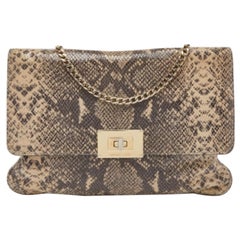 Michael Michael Kors - Pochette in pelle effetto pitone beige con catena Sloan