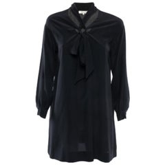 Diane von Furstenberg Minivestido acampanado con cuello de seda negro y detalle de lazo XXS