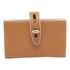 Furla Cartera compacta con solapa de piel marrón claro