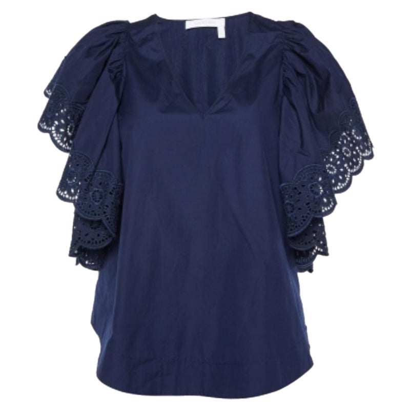 See By Chloe Top con mangas acampanadas y ribete de encaje de algodón azul S en venta