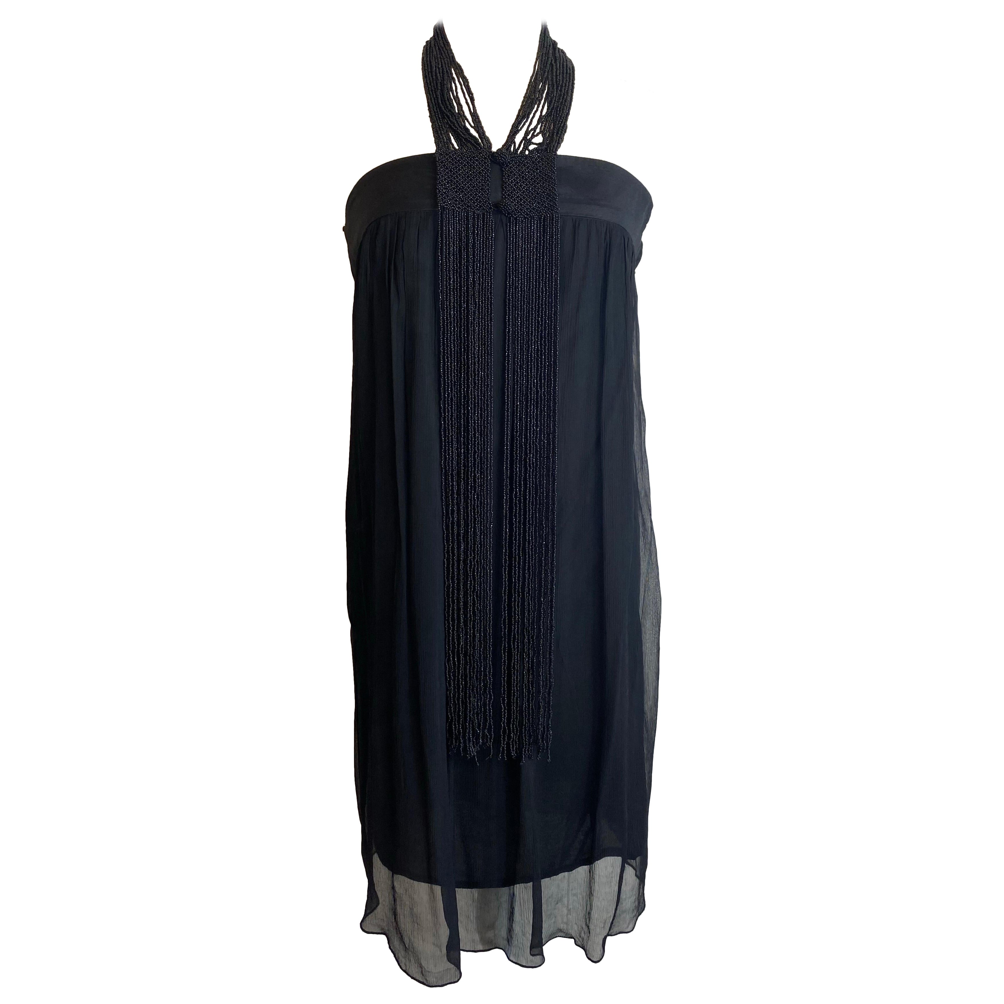 Schwarzes perlenbesetztes Midikleid von Kookai. im Angebot
