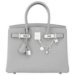 Hermes Olga Breloque Palladium and Leather Bag Charm (SHG-36999) – LuxeDH