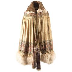 1920s gold lamé evening cape with fox fur trim