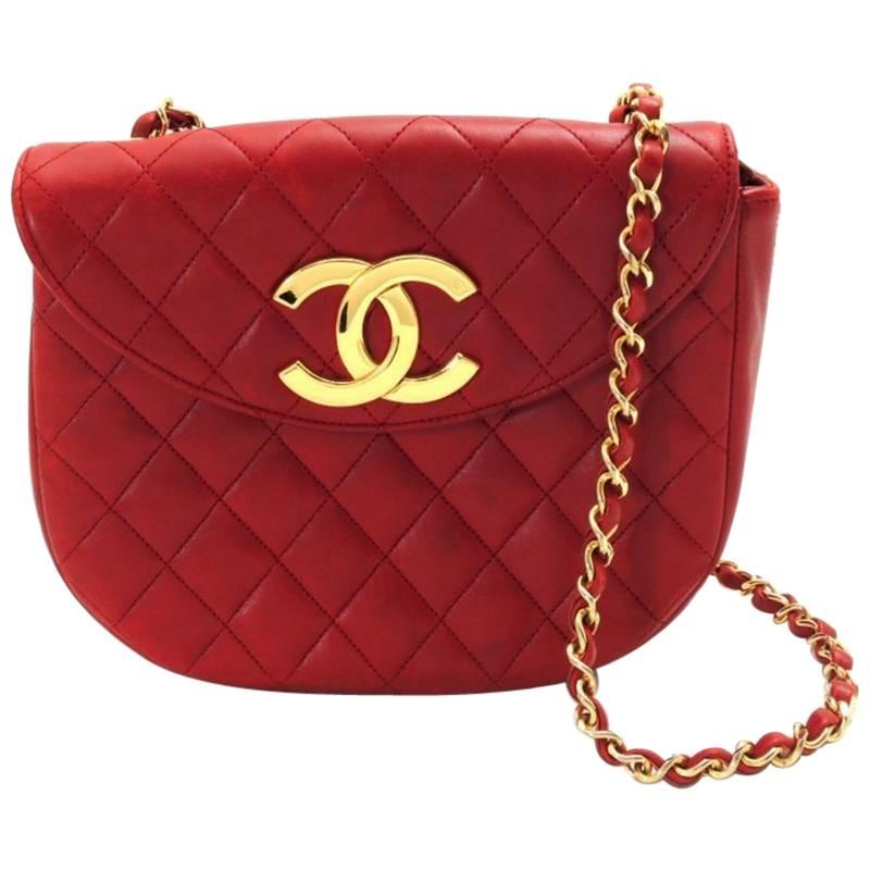 Vintage CHANEL red lambskin oval flap and shape 2.55 shoulder bag with large CC. For Sale