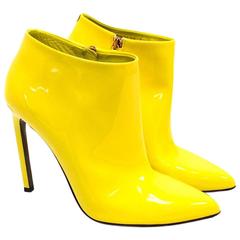 Botines de tacón de charol amarillo Gucci