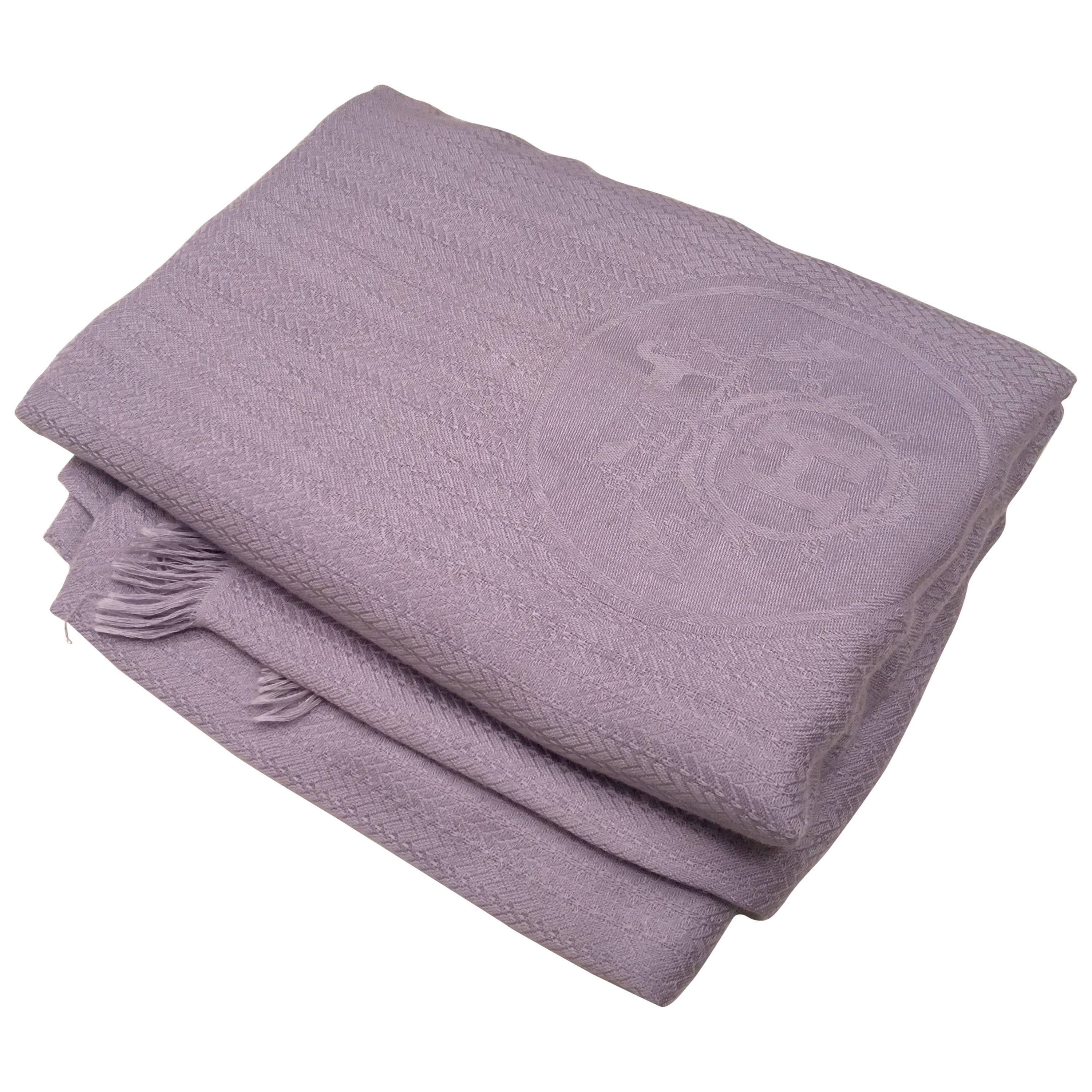 Presented here is a vintage lavender Hermes shawl. The beautiful shade of violet and the plush color shows off the incredible quality. This style is no longer made. It was very expensive when it was originally made in the 90’s so there is double ply