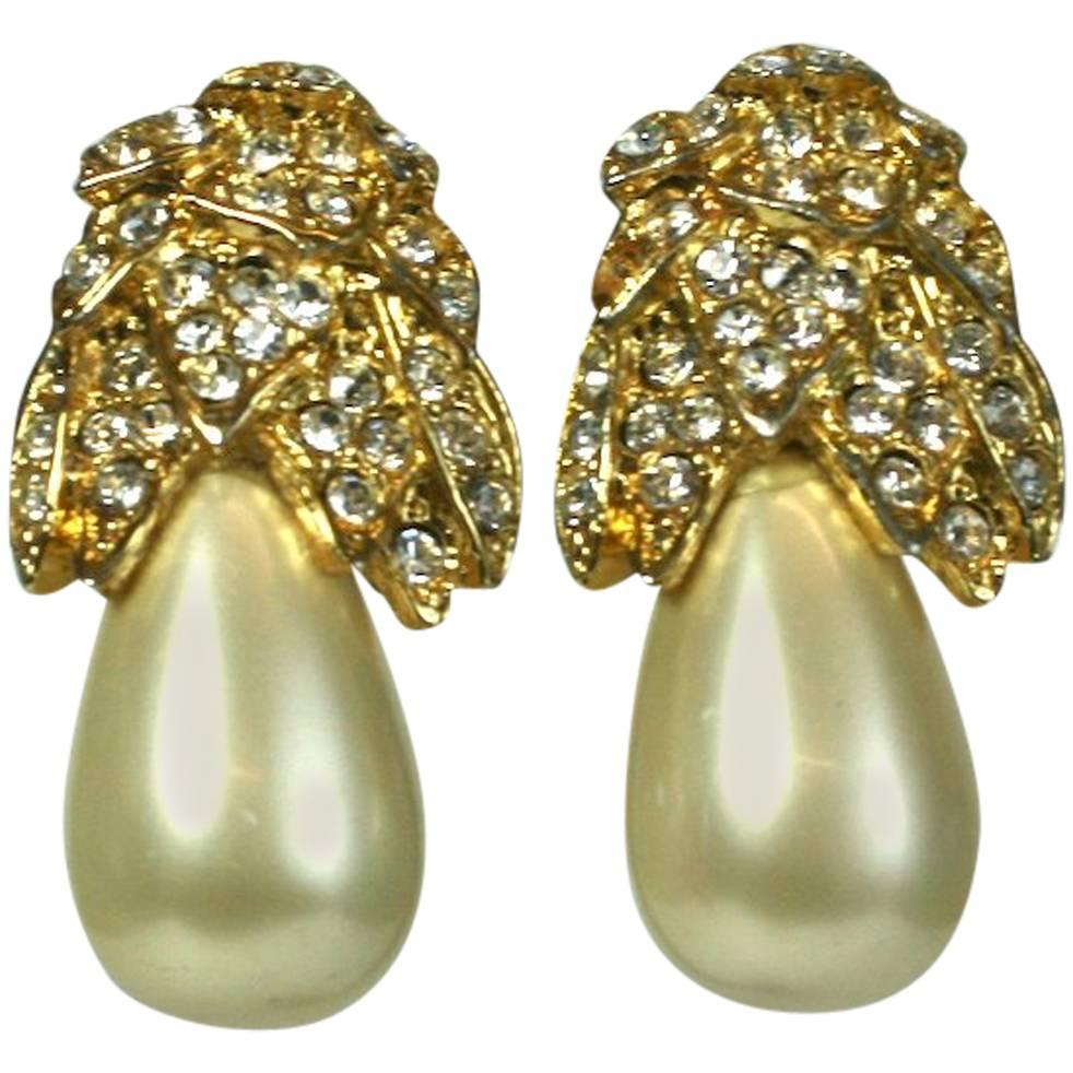 Vintage Givenchy faux pearl clip on earrings, Gold tone, c1980s For Sale at  1stDibs  vintage givenchy earrings, givenchy pearl earrings, vintage  givenchy clip on earrings