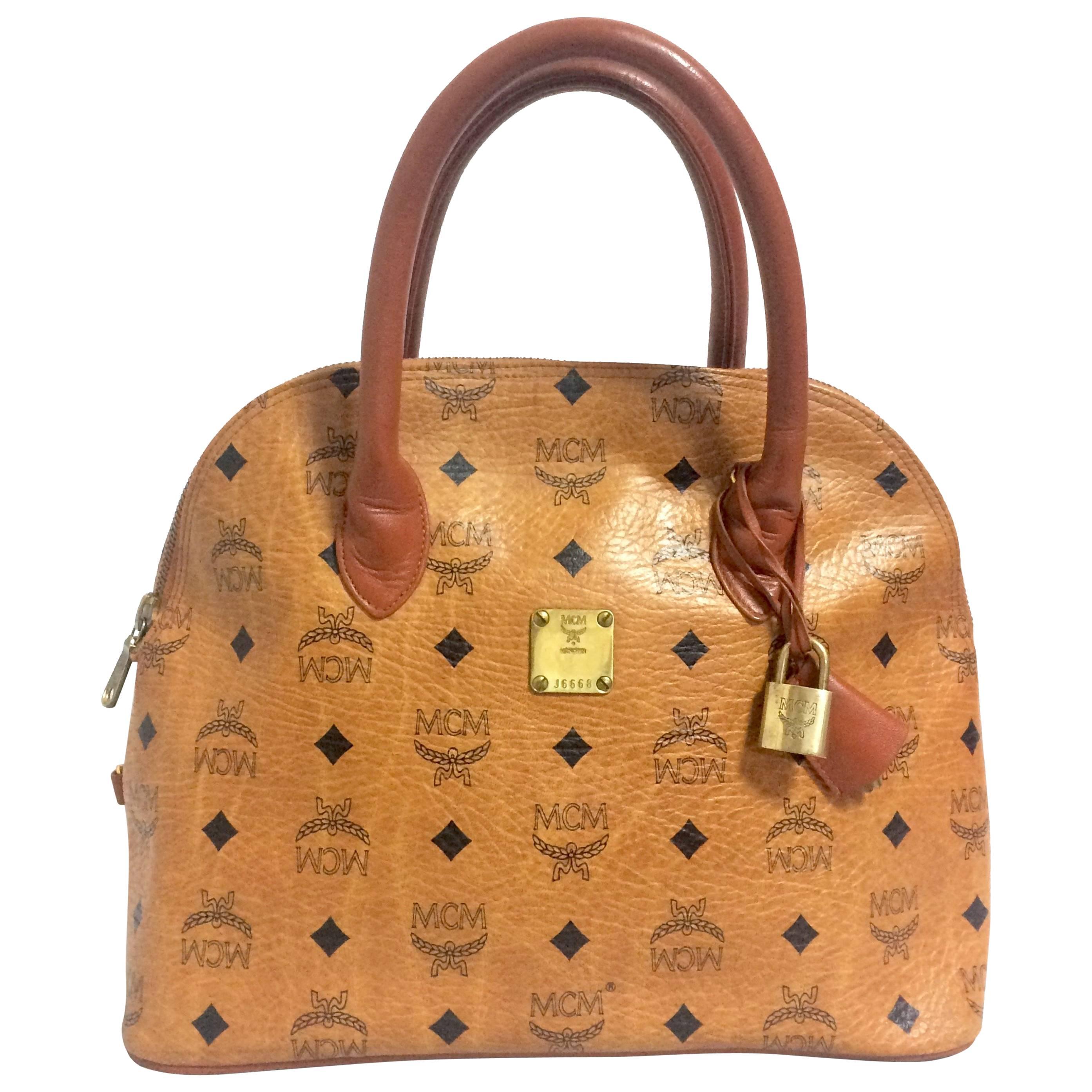 Vintage MCM classic brown monogram handbag in bolide style by Michael Cromer.