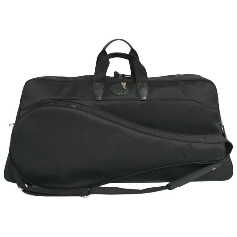 Sac de tennis HERMES en toile à chevrons noirs avec sa serviette noire