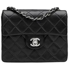 2000s Chanel Black Quilted Lambskin Mini Flap Bag