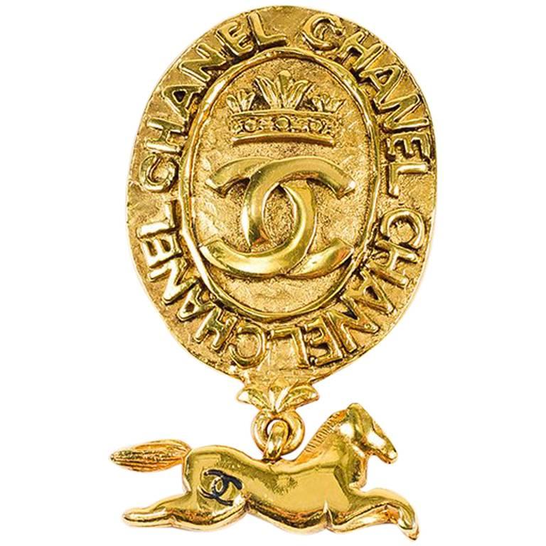 Chanel Vintage Gold 'CC' Crown Horse Charm Medallion Brooch For Sale