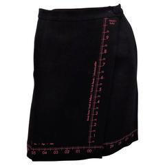 Moschino vintage "nobody's perfect" tape measure wrap skirt  