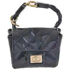 CHANEL Black Patent Leather Quilted Reissue Mini Belt Bag