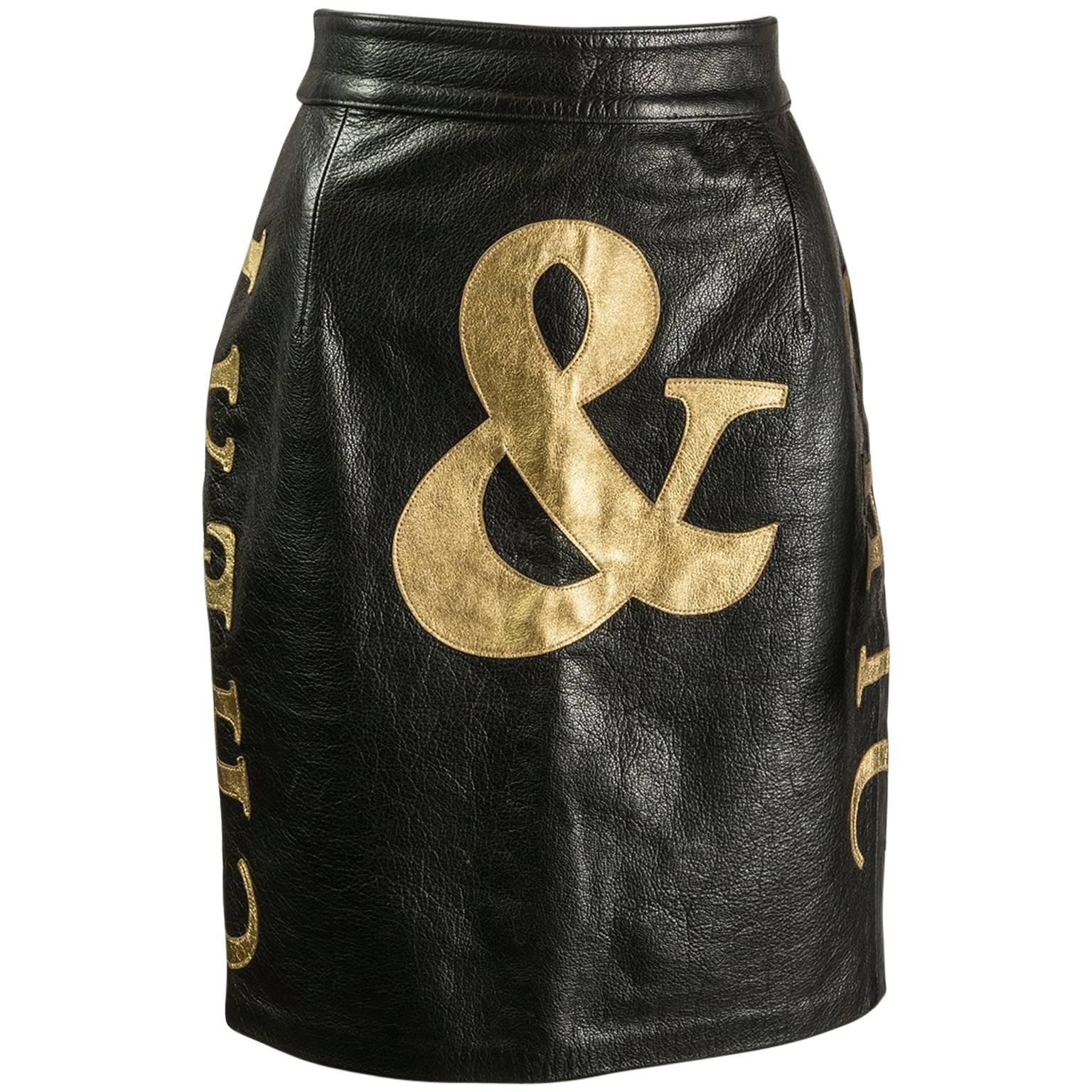 Moschino Cheap and Chic black and gold leather skirt, 1990s For Sale
