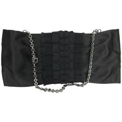 Ferragamo black silk with gros grain ribbon applique clutch handbag