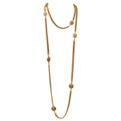 Early 1990s Chanel Gilt Long Necklace with Medallions