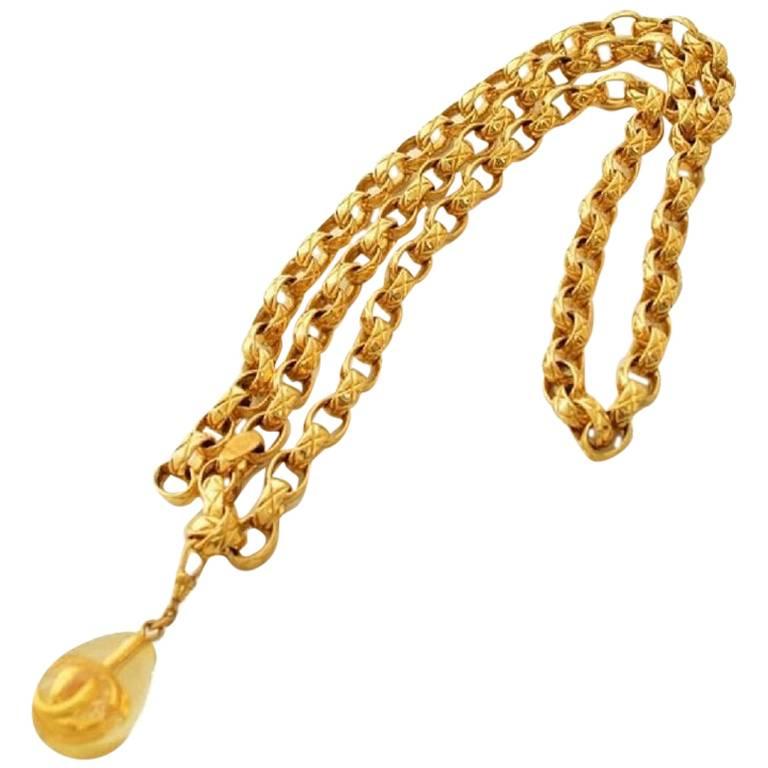 MINT.Vintage CHANEL double strand golden chain belt with CC teardrop charm.