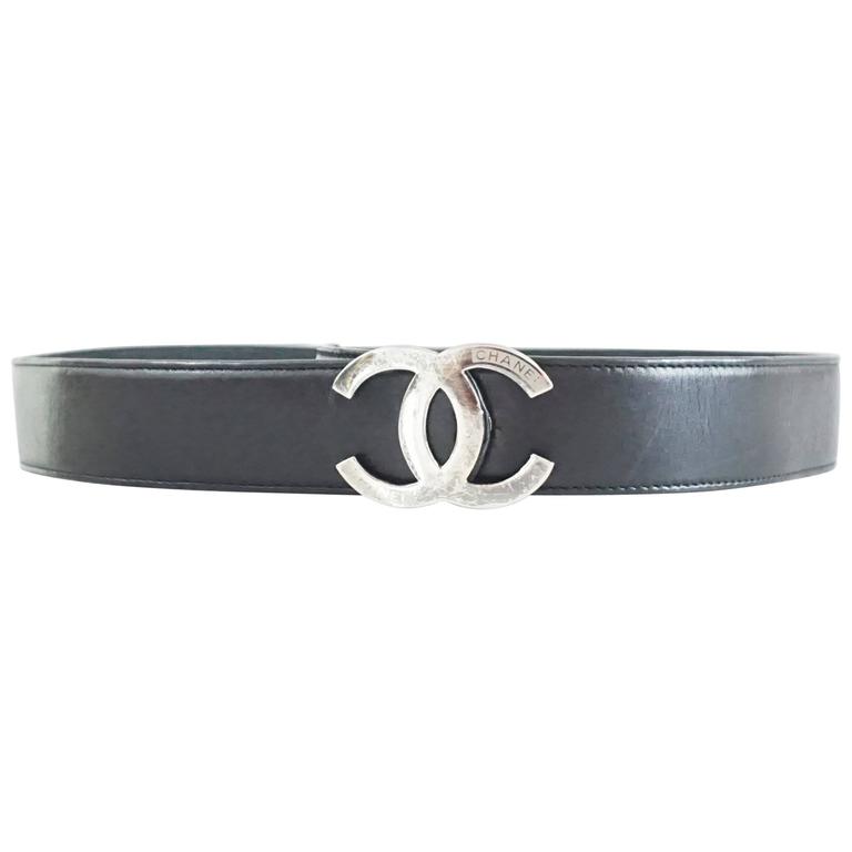 Chanel Black Leather Belt with Silver Logo Buckle - 32 at 1stDibs