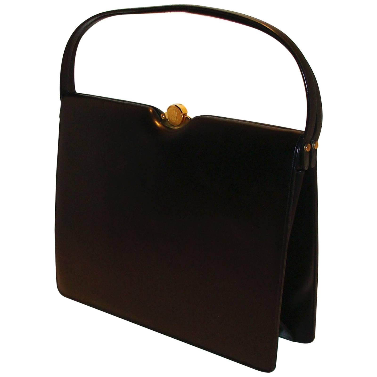 Elegantly Tailored Black Calf Kelly Style bag by Nettie Rosenstein.  