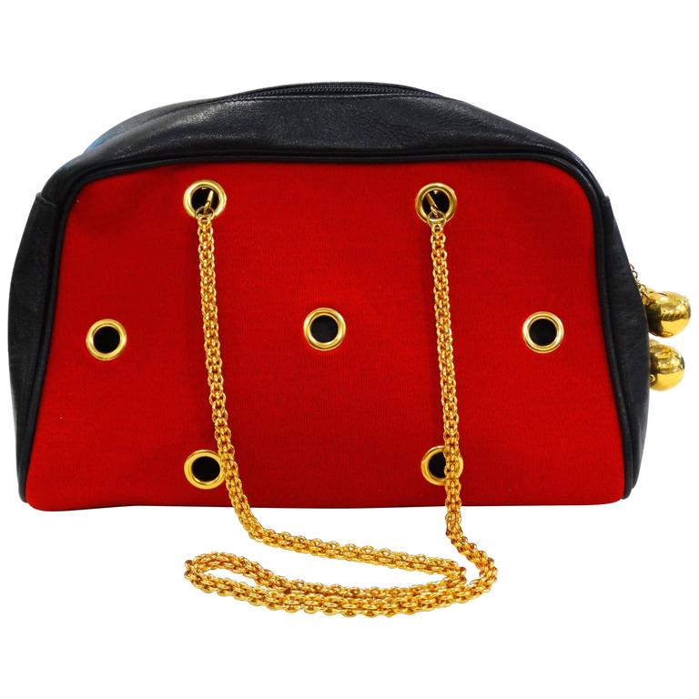 1980s Moschino Red Grommet Bag For Sale at 1stDibs